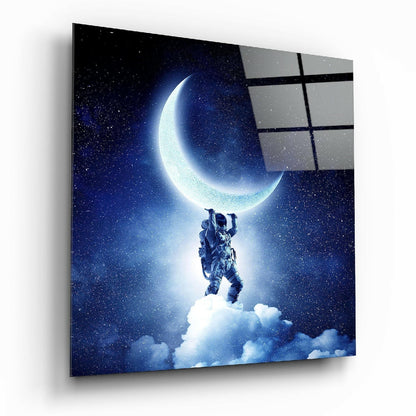 Astronaut Lifting Crescent Moon Glass Wall Art