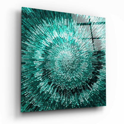 Square glass wall art with radiating turquoise, teal, and white rectangular pieces extending from center point.