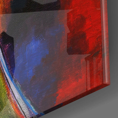 Three-dimensional glass wall art block with red, blue, and multicolored layered translucent panels viewed from corner angle.