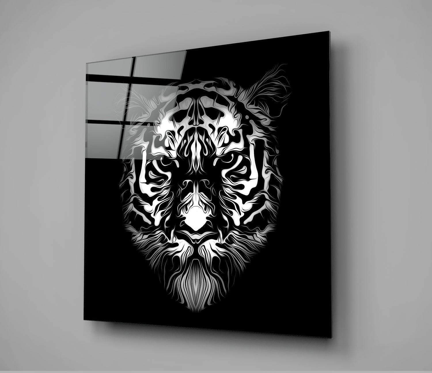 Black glass wall panel displaying white and gray stylized tiger head with detailed fur texture against dark background, angled perspective.