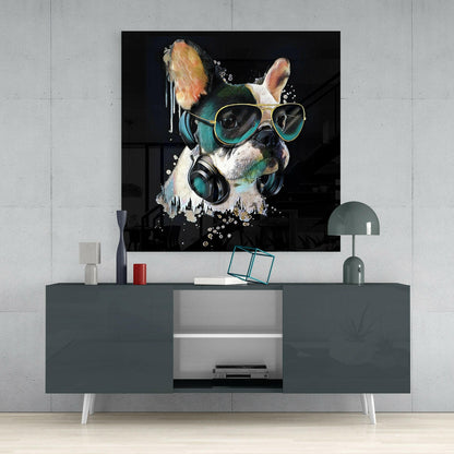 Punk Dog Glass Wall Art displayed on a gray media console, showing a stylized French Bulldog wearing gold aviator sunglasses and headphones against a black background with teal and orange accents.