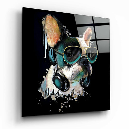 Angled perspective of glass wall art featuring a stylized French Bulldog wearing turquoise sunglasses and headphones against black background with colorful watercolor accents.