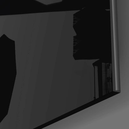 Close-up side view of black glass panel showing punk dog silhouette profile against gray background.