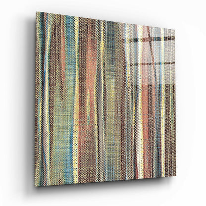 Angled perspective of a textured glass wall panel displaying vertical stripes in earthy tones of brown, rust, teal, and cream.