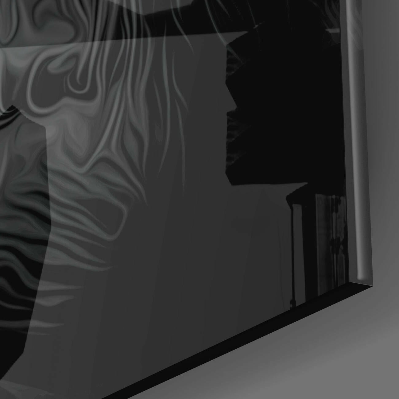 Side profile silhouette of glass wall art featuring marbled monochrome pattern and dark figure detail against light background.