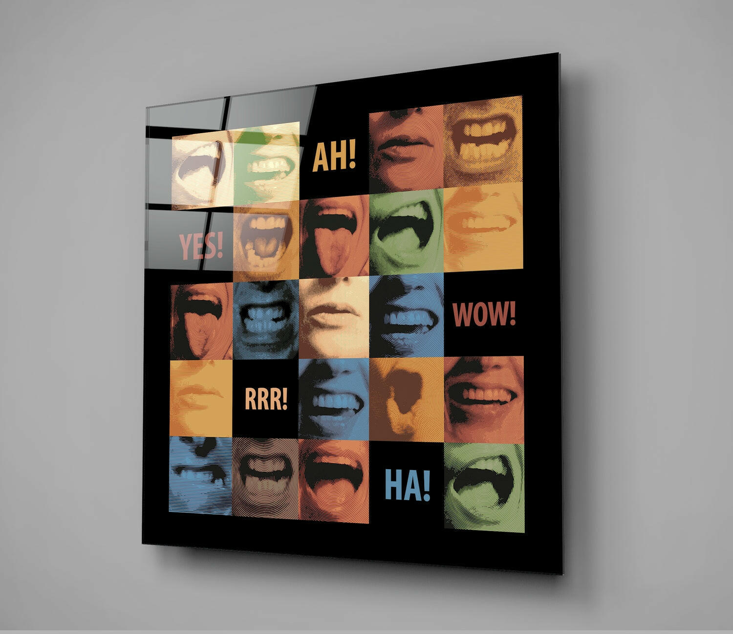 Glass wall art displaying a grid of colorful close-up mouth photographs with text reading "AH!", "YES!", "WOW!", "RRR!", and "HA!" on black background.