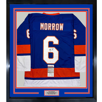 Framed navy and red New York Islanders jersey number 6 with "MORROW" nameplate, signed, displayed front-facing with JSA authentication certificate visible.