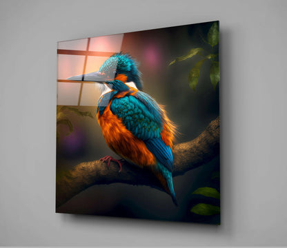 A vibrant kingfisher with turquoise and orange plumage perched on a branch, displayed on a glass wall panel with a window reflection background.