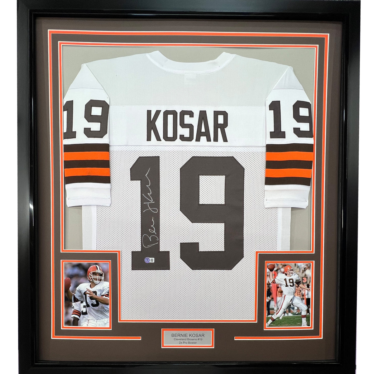 Bernie Kosar signed Cleveland Browns white football jersey back view in 35x39 framed display