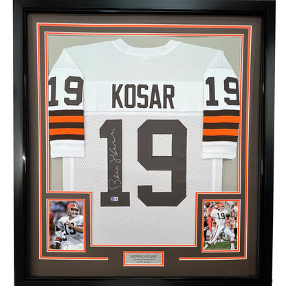 Bernie Kosar signed Cleveland Browns white football jersey back view in 35x39 framed display