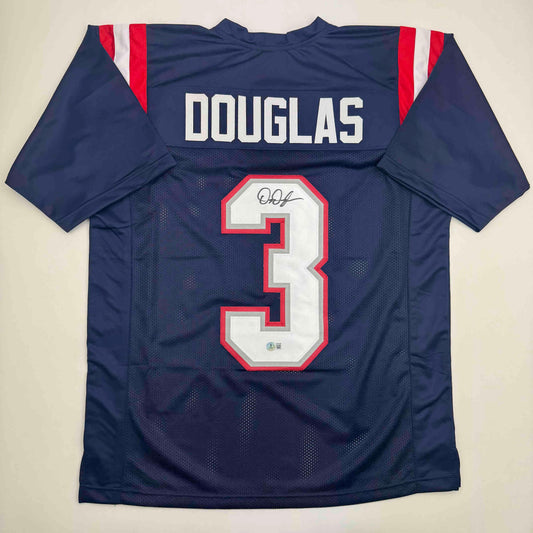 Navy blue football jersey with "DOUGLAS" and number 3 displayed on back, featuring red and white trim, laid flat on white background.