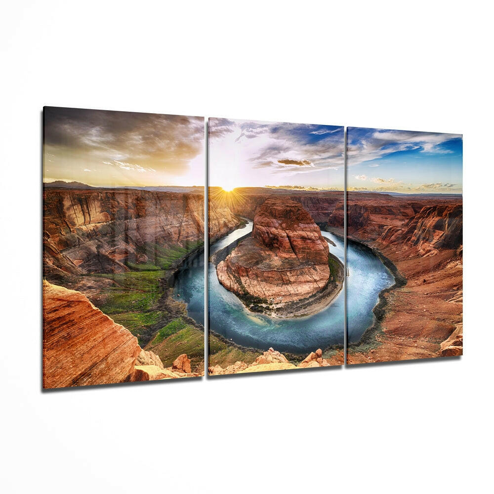 Horseshoe Bend triptych glass panel artwork displaying red canyon walls, turquoise river loop, and sunset sky across three mounted sections.