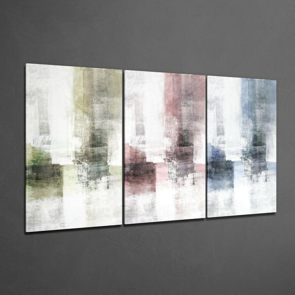 Three rectangular glass panels with abstract watercolor designs in soft green, pink, and blue tones mounted on gray wall.