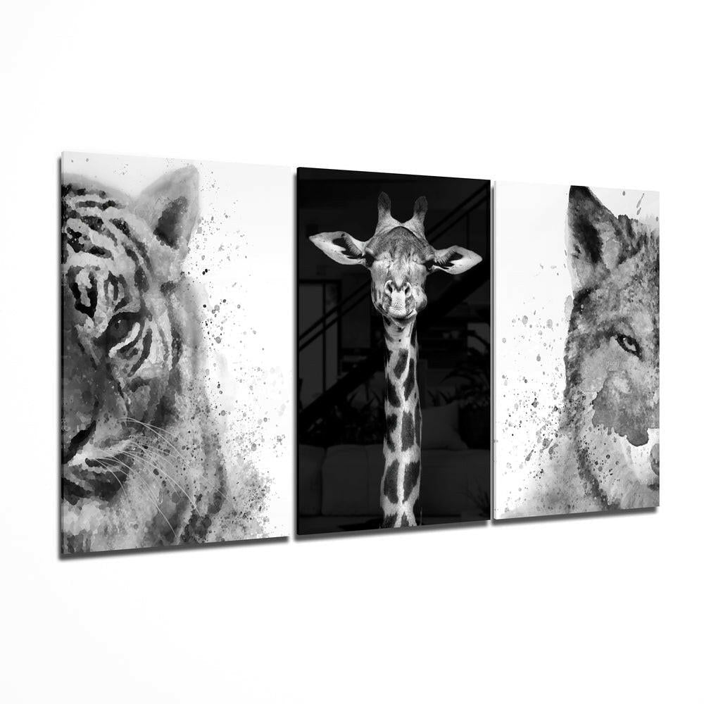 Three black and white glass panels displaying watercolor-style portraits of a tiger, giraffe, and lion against white backgrounds.