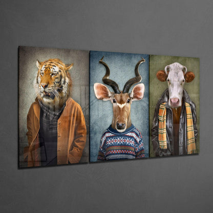 Three glass wall panels displaying anthropomorphic animals in clothing: a tiger in brown jacket, an antelope in patterned sweater, and a cow in plaid scarf, mounted on gray wall.