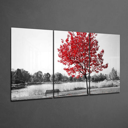 Two black-framed glass panels displaying a lakeside scene with a red-leafed tree as focal point against monochromatic landscape.