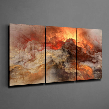 Three-panel glass wall art depicting a dramatic volcanic landscape with orange, red, and golden tones, mounted on a gray wall.