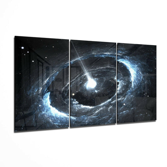 Three-panel glass wall art displaying a cosmic vortex with blue-white light rays and stars on black background.
