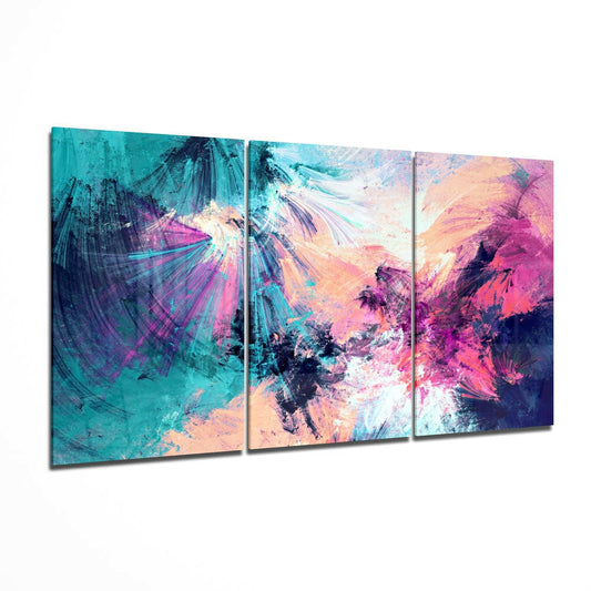 Three-panel glass wall art displaying abstract turquoise, pink, and peach paint bursts with palm tree silhouettes, angled perspective view.