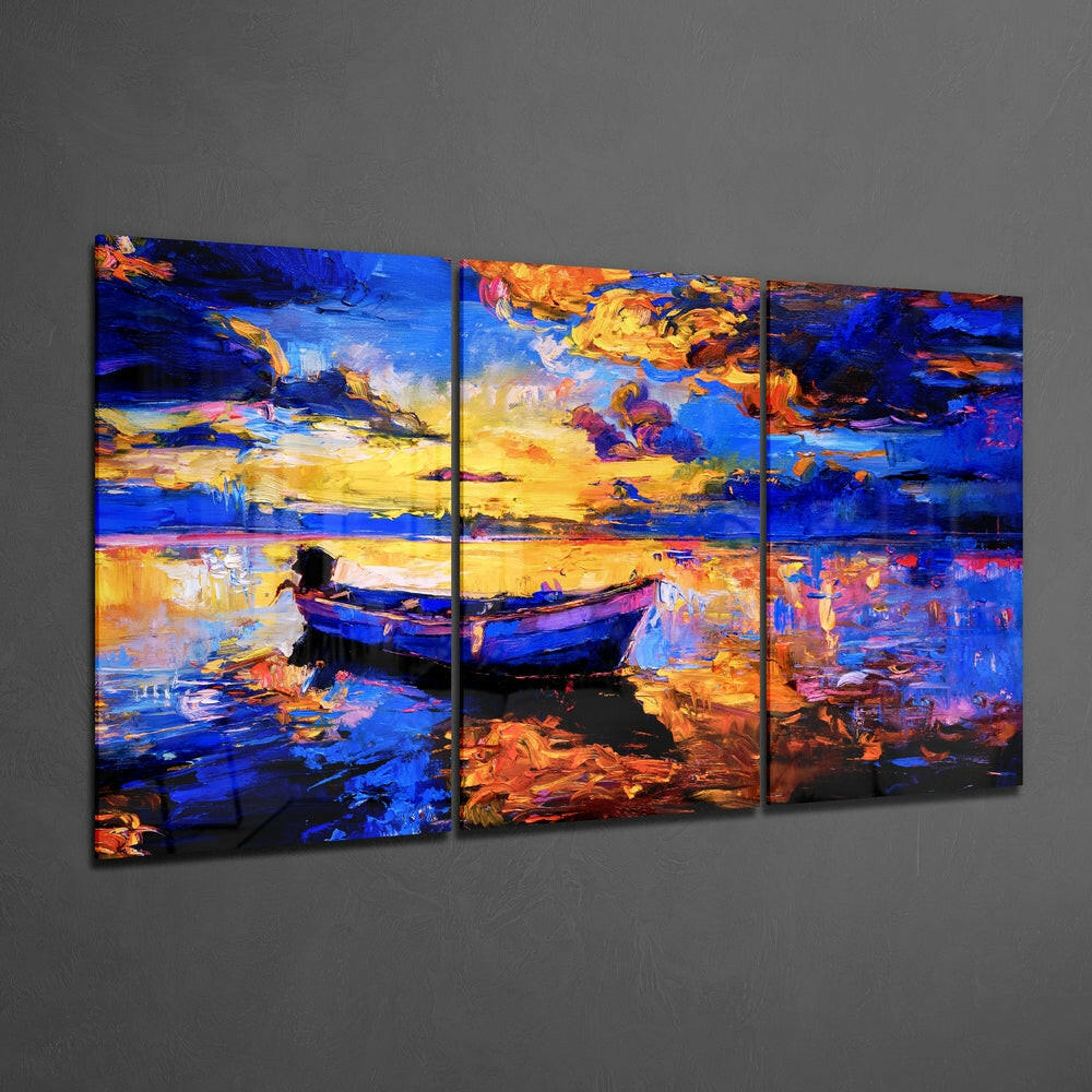 Three-panel glass wall art depicting a moored boat at sunset with vibrant blue, yellow, and orange brushstrokes reflecting on water.
