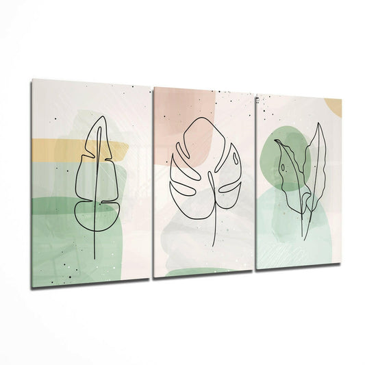 Three-panel glass wall art displaying minimalist line-drawn plants with watercolor washes in green, beige, and blush tones.