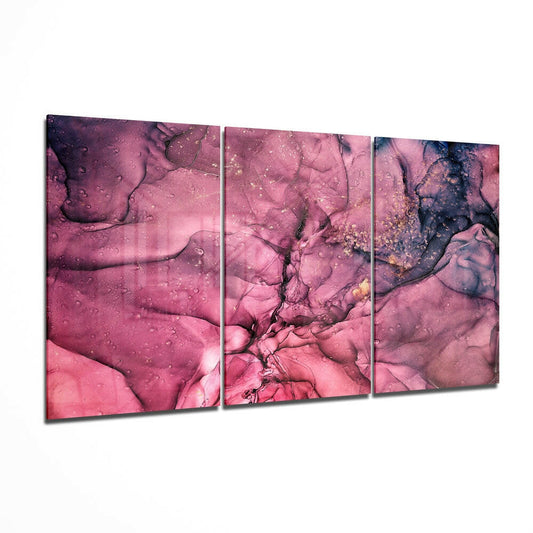Three-panel rose and plum marble glass wall art displaying swirling ink patterns with gold accents, angled perspective view.
