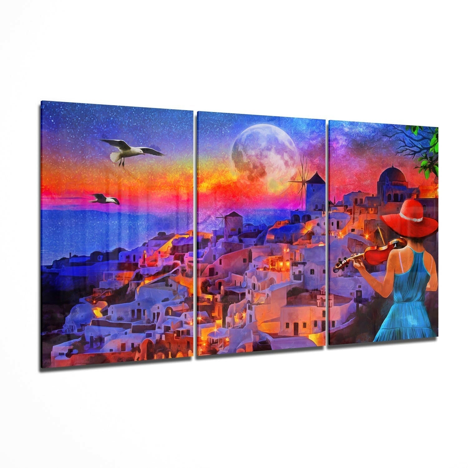 Three-panel glass wall art displaying a colorful Mediterranean village scene with a woman playing violin, illuminated by a glowing moon and vibrant sunset sky.