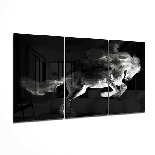 Three-panel black and white glass art displaying a galloping horse with dramatic smoke effects against dark interior background.