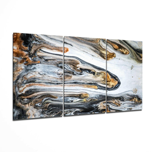 Three-panel glass wall art displaying swirled marbling in black, white, gold, and bronze tones with fluid, organic patterns.