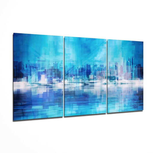 Three-panel blue glass wall art displaying a layered cityscape with waterfront reflection and pixelated effect.