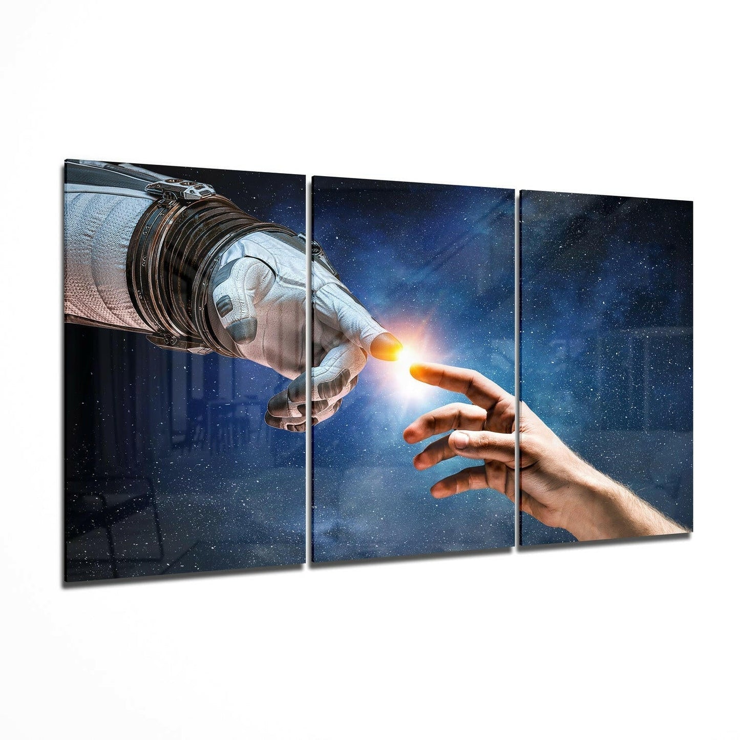 Three-panel glass wall art displaying an astronaut's gloved hand touching a human hand against a starry night sky background.