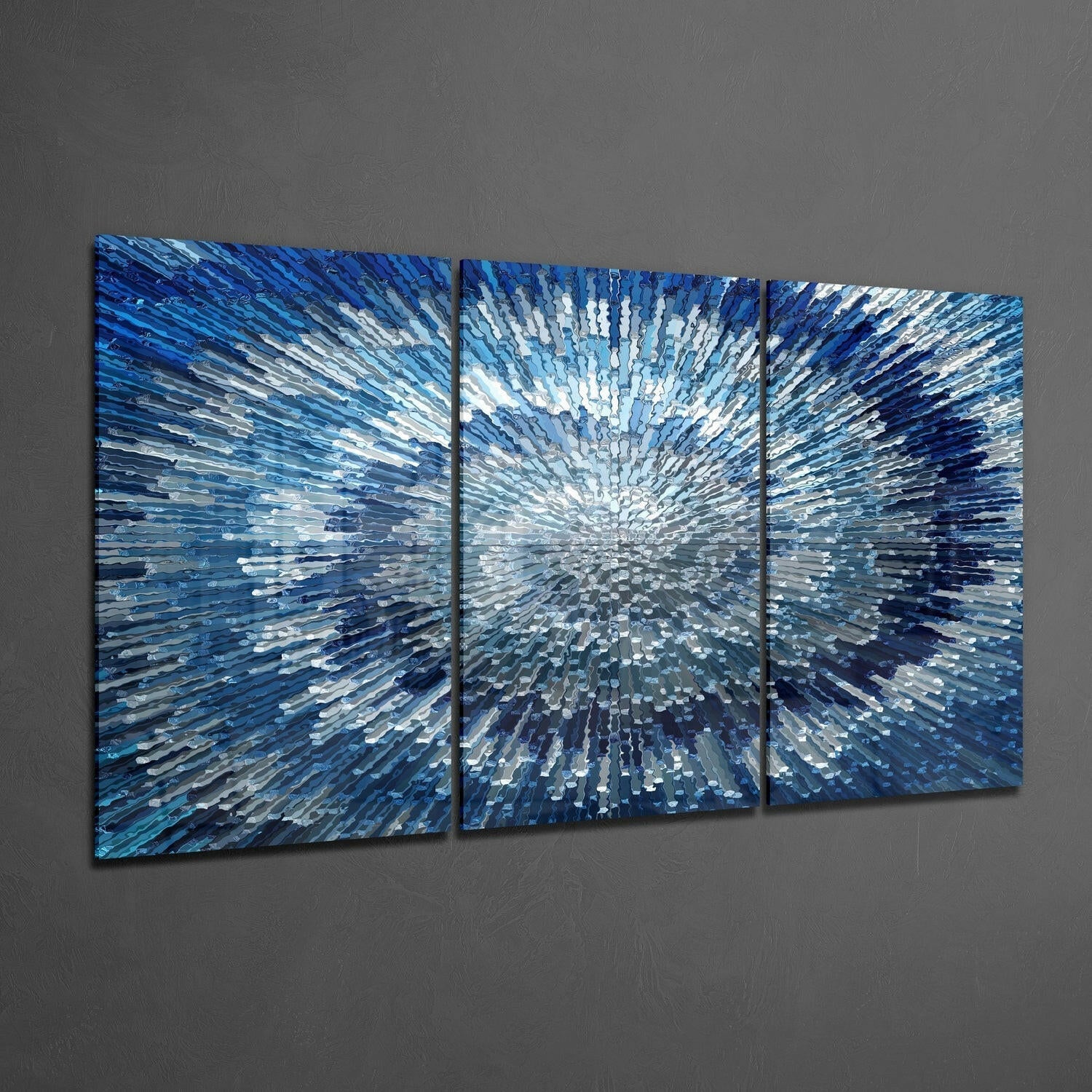 Three-panel blue glass wall art with radiating white and silver brushstroke pattern converging toward center point.