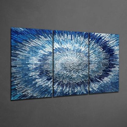 Three-panel blue glass wall art with radiating white and silver brushstroke pattern converging toward center point.
