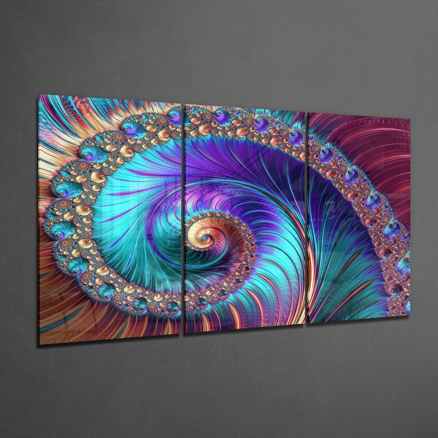 Three-panel glass art displaying a vibrant fractal spiral in turquoise, purple, and copper tones mounted on a gray wall.