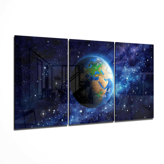 Three-panel glass art display showing Earth centered in space with stars and galaxies on deep blue background.