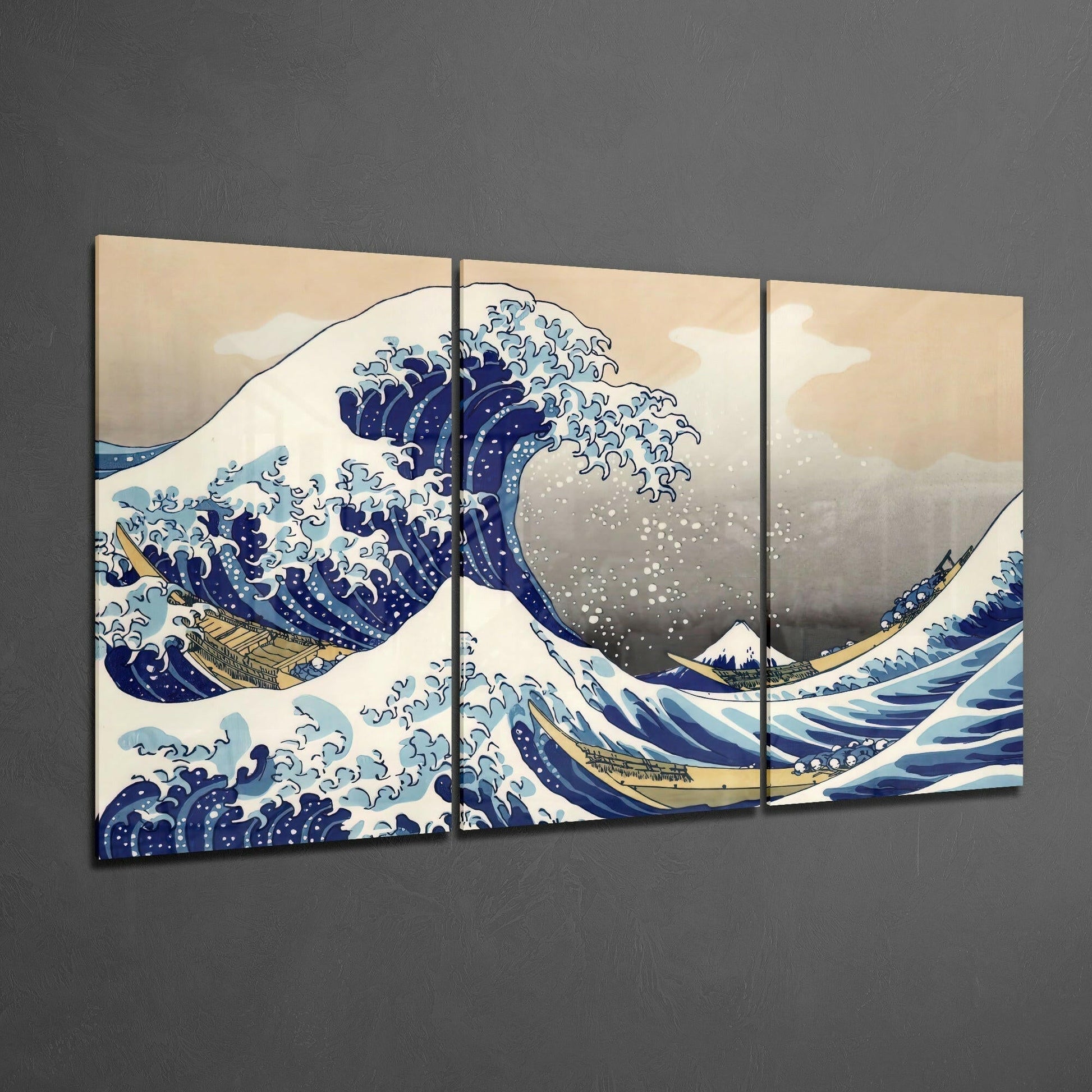 Three-panel glass art display of The Great Wave featuring blue and white waves with gold boats against a beige sky background.