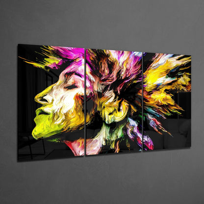 Three-panel triptych glass art featuring an abstract colorful profile with vibrant yellow, magenta, and pink brushstrokes against black background.