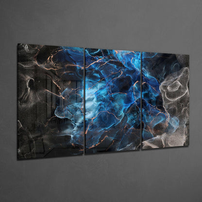 Three-panel glass art installation with blue, black, and copper veining displayed on gray wall.
