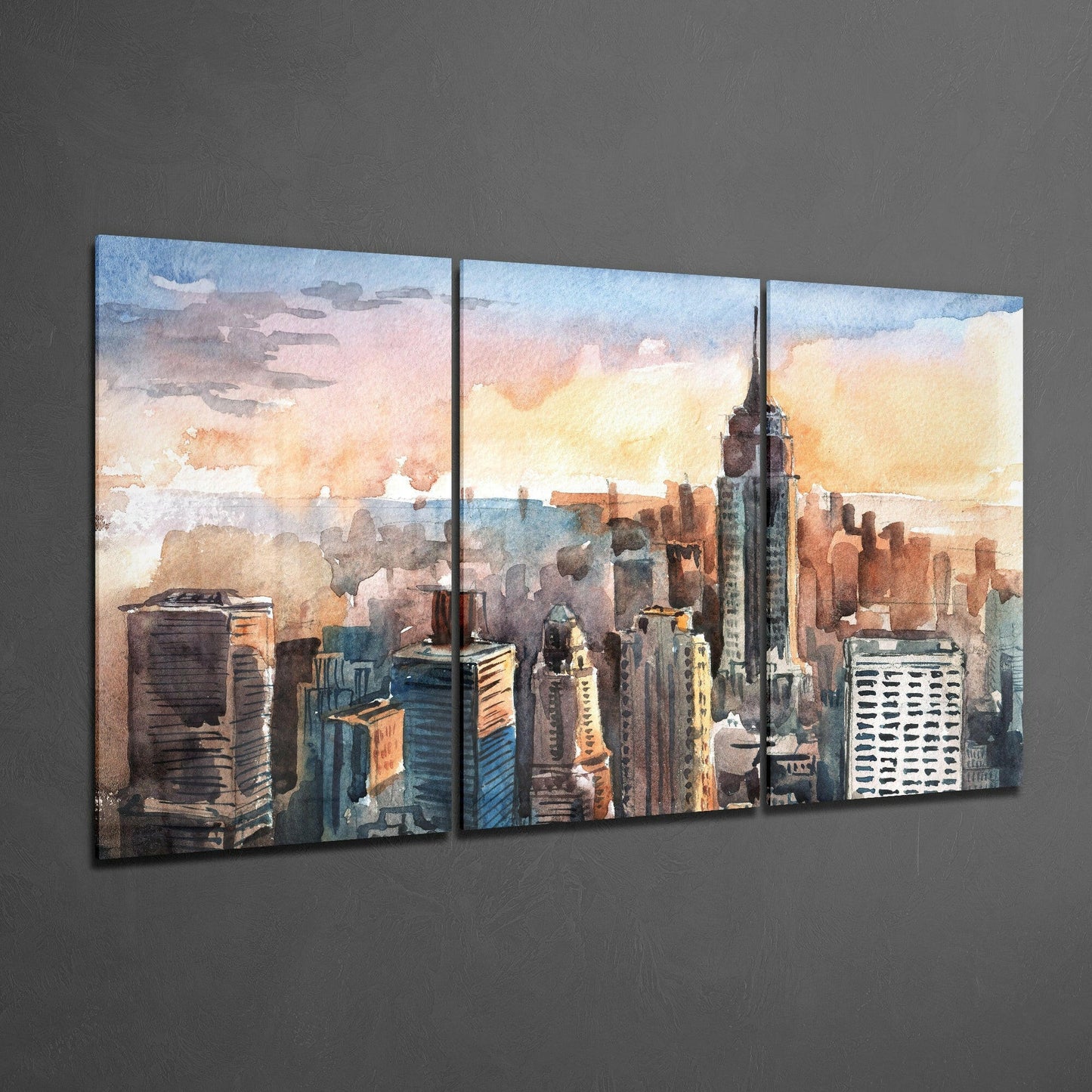 Three-panel watercolor glass art depicting Manhattan skyline at sunset with warm golden and blue tones, featuring Empire State Building and surrounding skyscrapers.