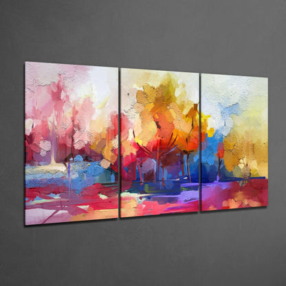 Three-panel glass art displaying abstract forest landscape with vibrant pink, orange, yellow, and blue watercolor-style strokes on gray wall.