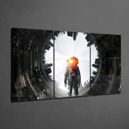 Three-panel glass art displaying astronaut in spacesuit silhouetted against bright circular window with cityscape frame.