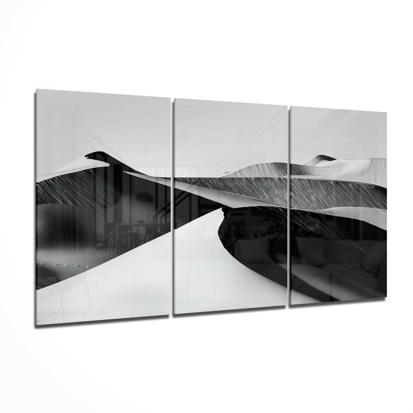 Three-panel black and white desert landscape glass art displaying rolling sand dunes with dramatic shadows and highlights.