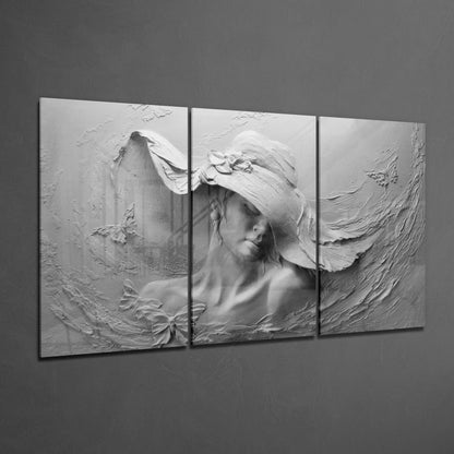 Three-panel white textured glass art depicting a woman in a wide-brimmed hat with flowing fabric and botanical details.