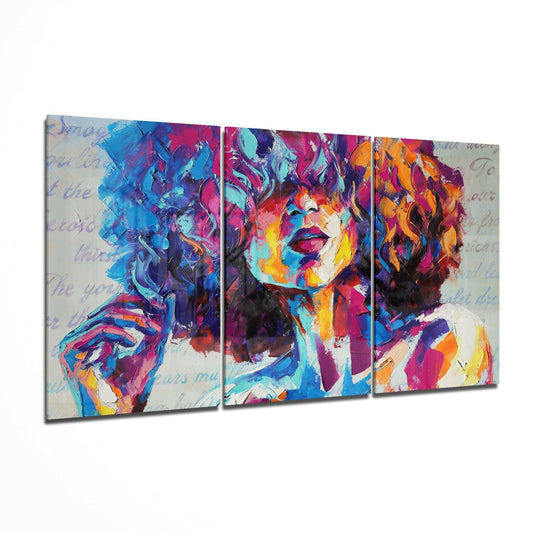 Three-panel glass art displaying a colorful portrait with vibrant blue, pink, orange, and yellow brushstrokes and handwritten text overlay.