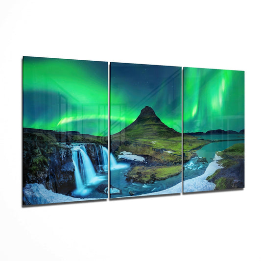Three-panel glass art display featuring Iceland landscape with green aurora borealis, waterfall, mountain peak, and glacial rivers.