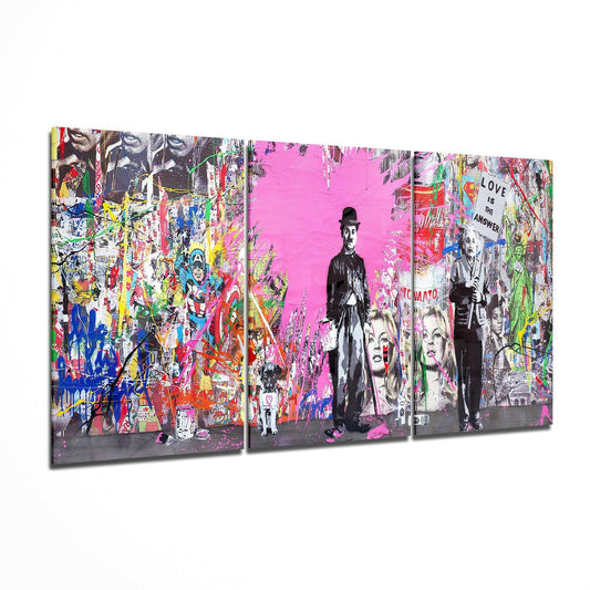 Three-panel glass art displaying vibrant street art with classic film figures, bright pink background, and colorful graffiti overlays.