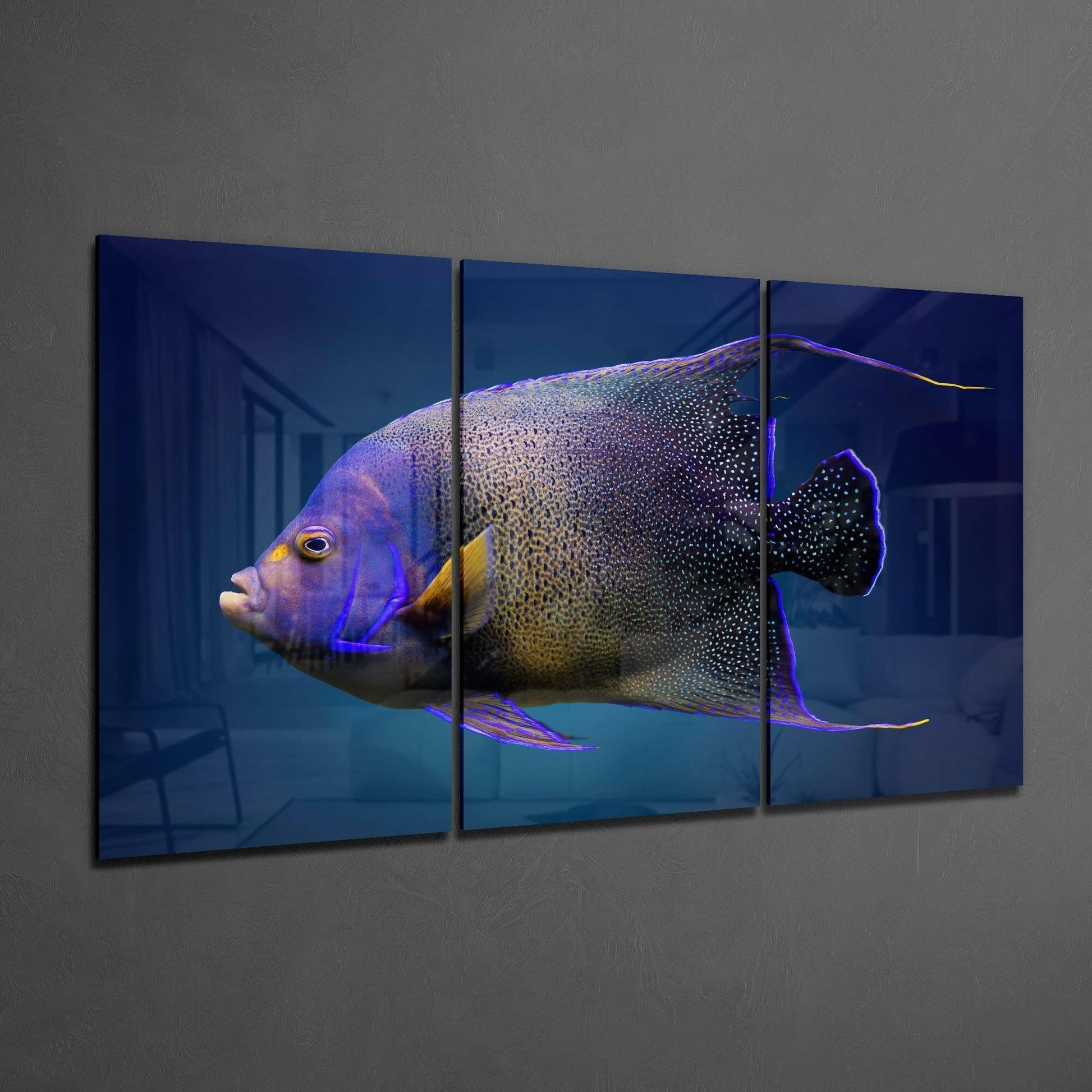 Three-panel glass art displaying a purple and gold angel fish with detailed scales against a deep blue background, mounted on a gray wall.