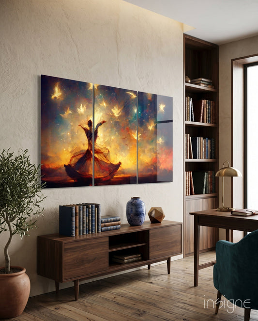 Multi-panel glass wall art depicting a figure in flowing fabric surrounded by golden light and white doves, displayed above a wooden console in a modern study room.