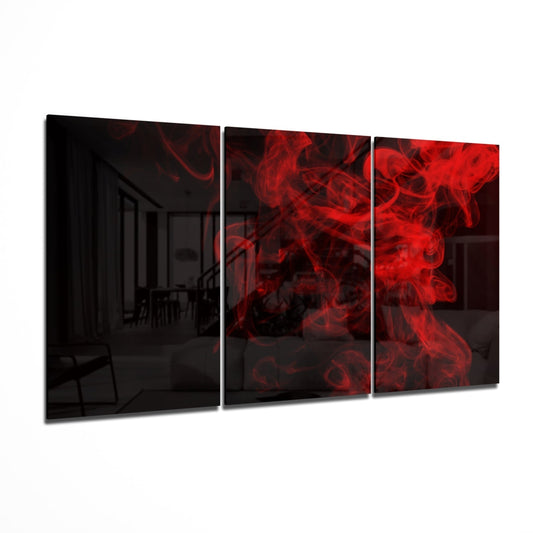 Three-panel red smoke glass wall art displayed at an angle, showing swirling crimson patterns against dark backgrounds.