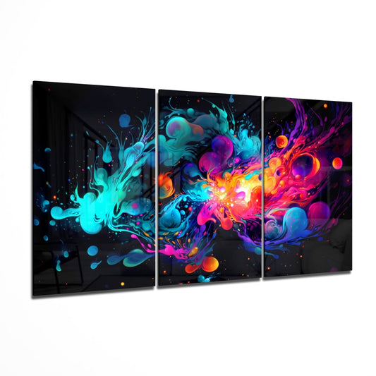 Three-panel glass wall art displaying vibrant cyan, magenta, orange, and purple fluid abstractions on black background, angled perspective view.
